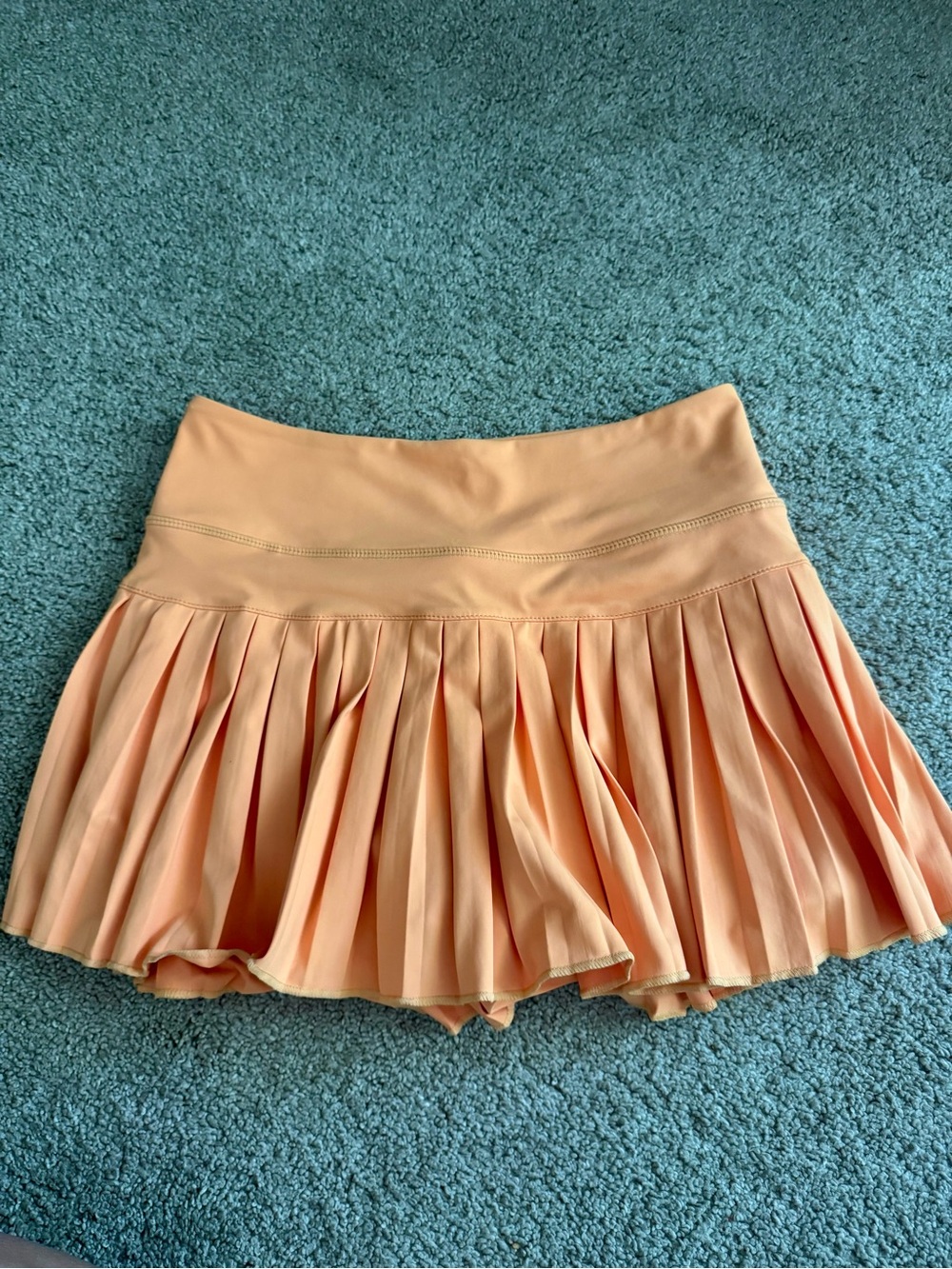 GoldHinge Peach Pleated Tennis Skort